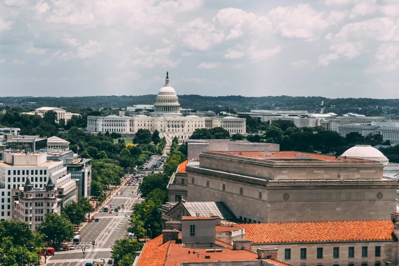 a view of the capitol from the top of a hill