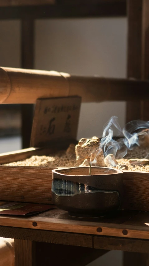 steaming rice with a set sitting on a table