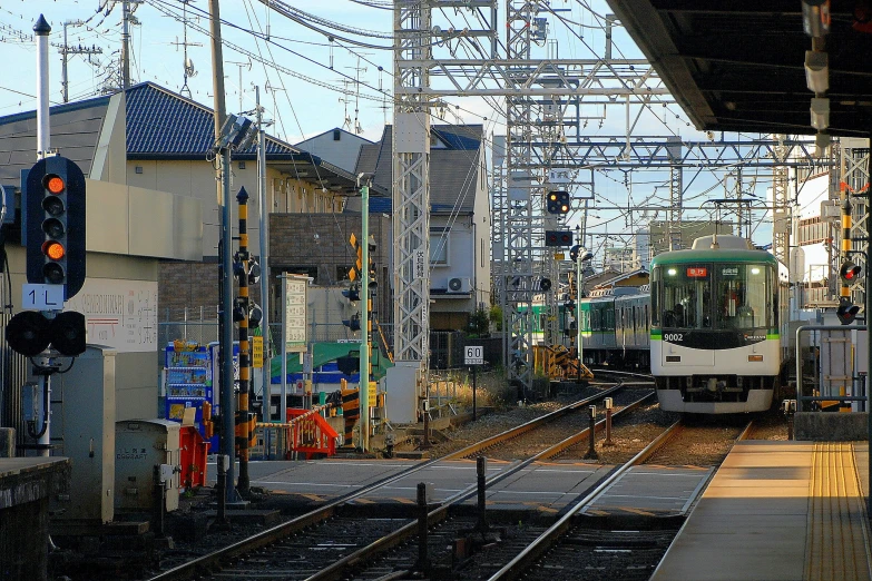 a train coming down the track with some other train tracks