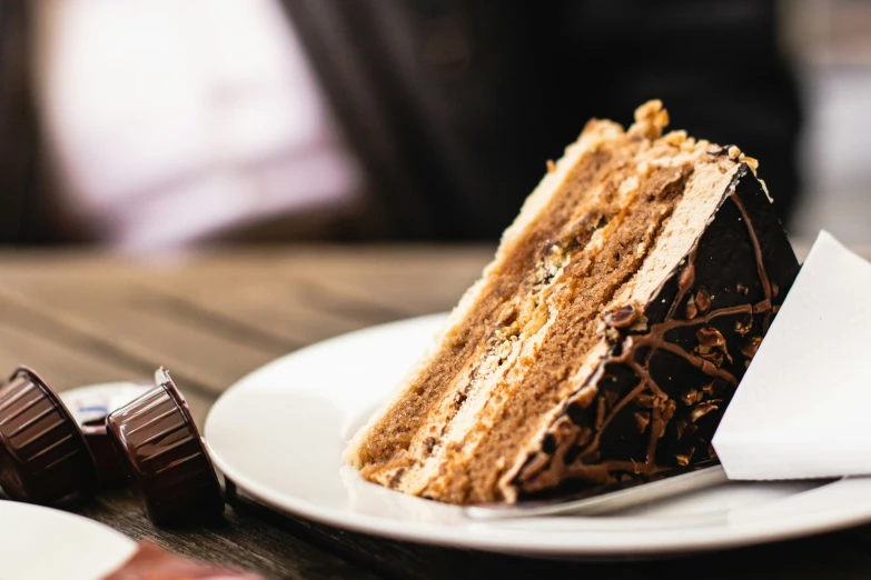 a piece of chocolate cake with a bite taken out of it