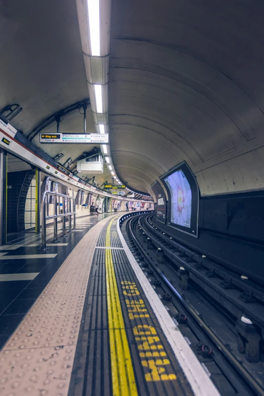 the train platform is empty for people to board