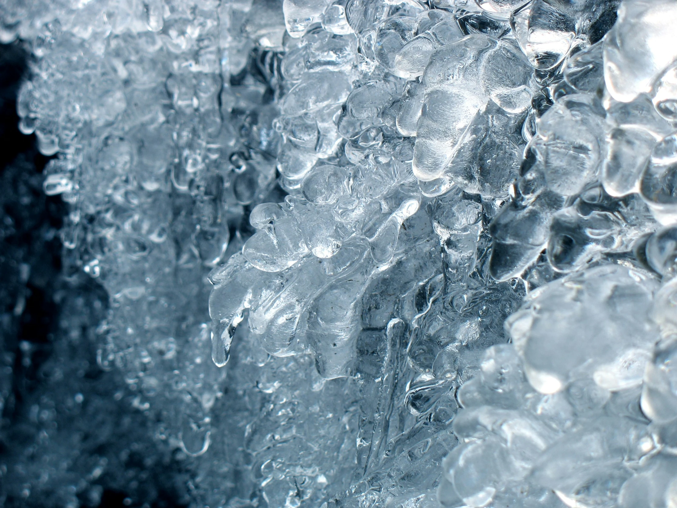 frozen bubbles are visible as the snow and rain falls