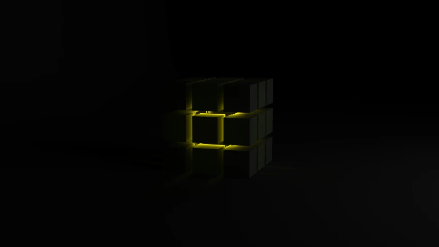 a yellow light is shining through some crates