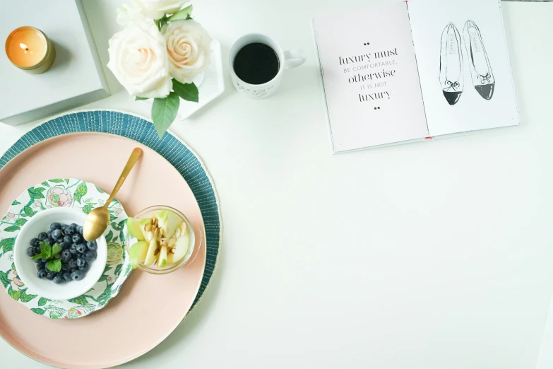 an image of table setting with fruit and coffee