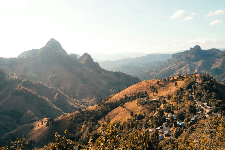 a mountain with a town in it sitting on a hill