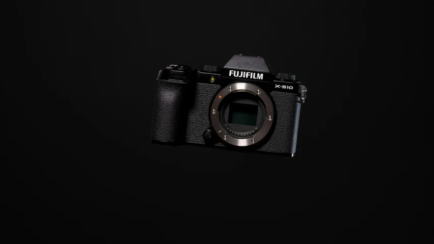 a close up of a camera on a black background