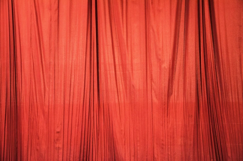 an image of curtains with the light coming through