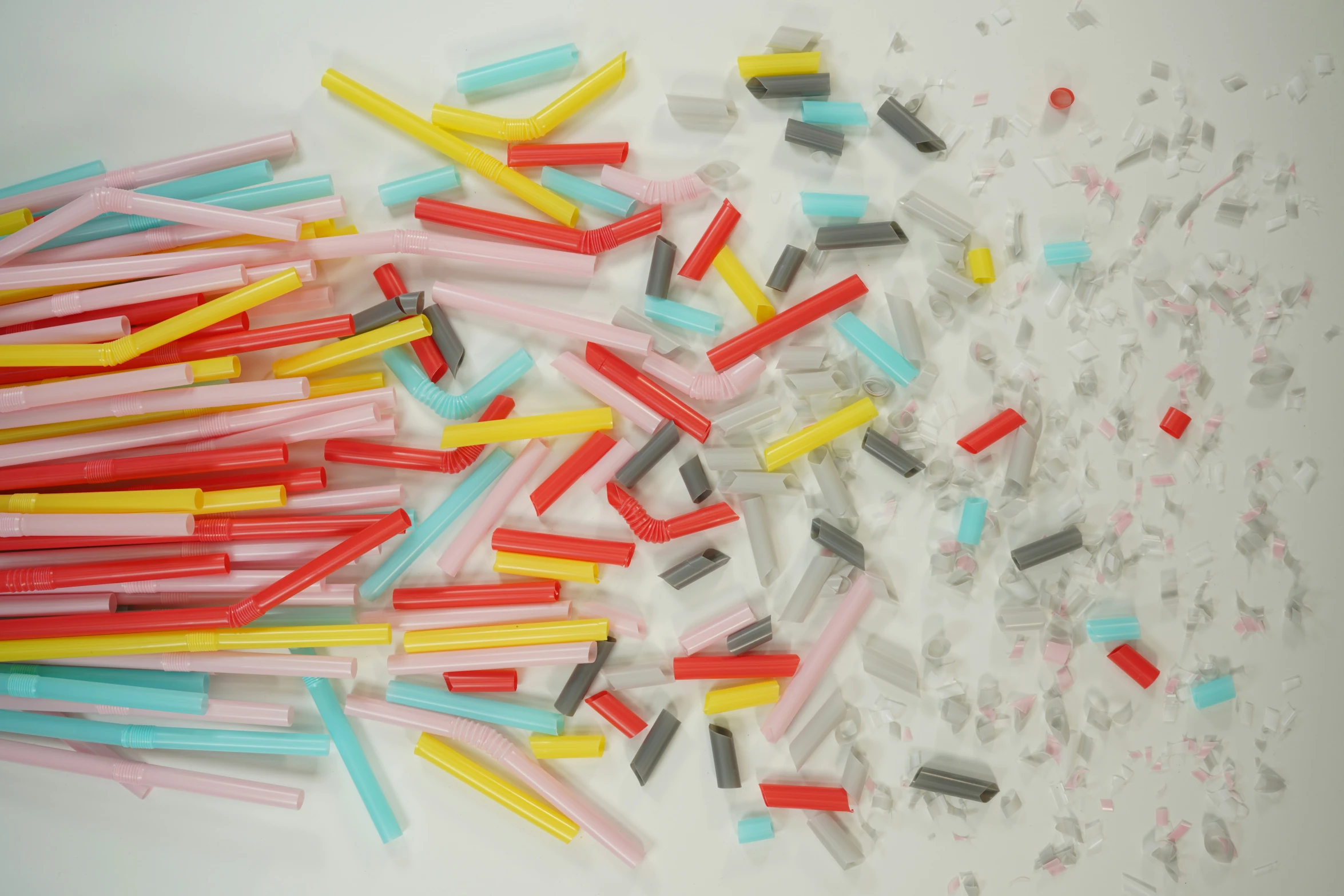 small colorful plastic objects laid out with colored sticks