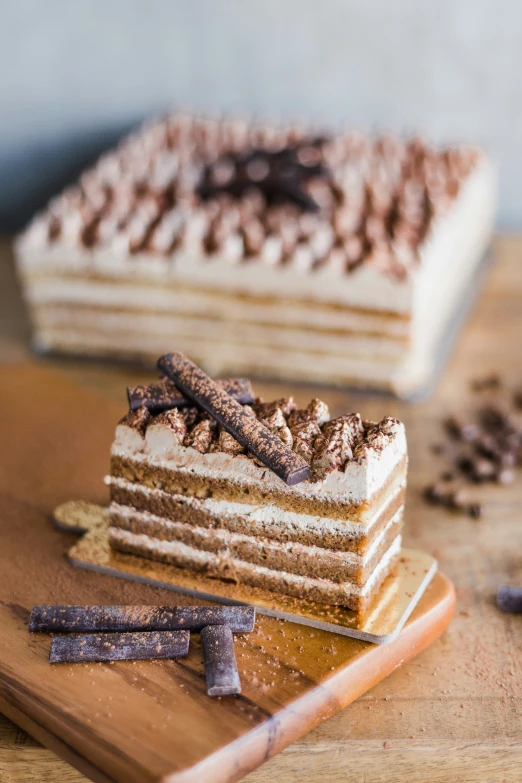 a cake that is on a  board with some chocolate chips