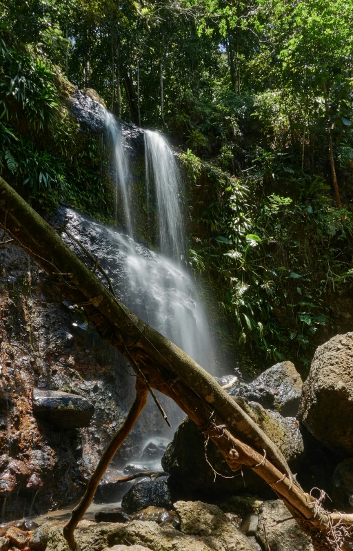 there is a waterfall with water coming down