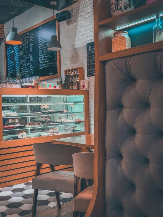 a restaurant with many items in a display case