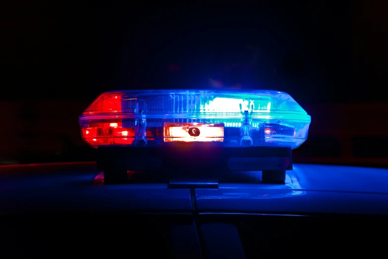 an image of the lights of a police car at night