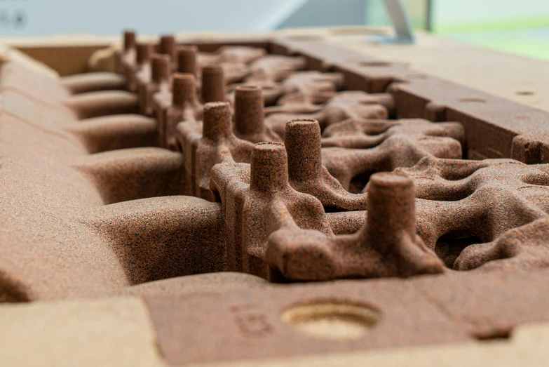 some clay structures sitting in a box