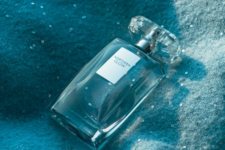 a glass bottle on a blue background