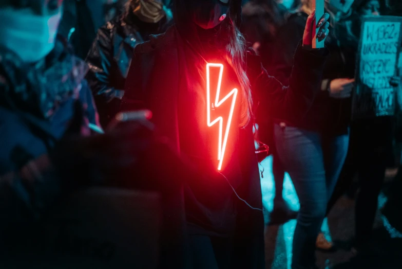 the back of a man wearing a light up sweatshirt