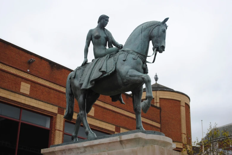 a statue of a man riding on the back of a horse