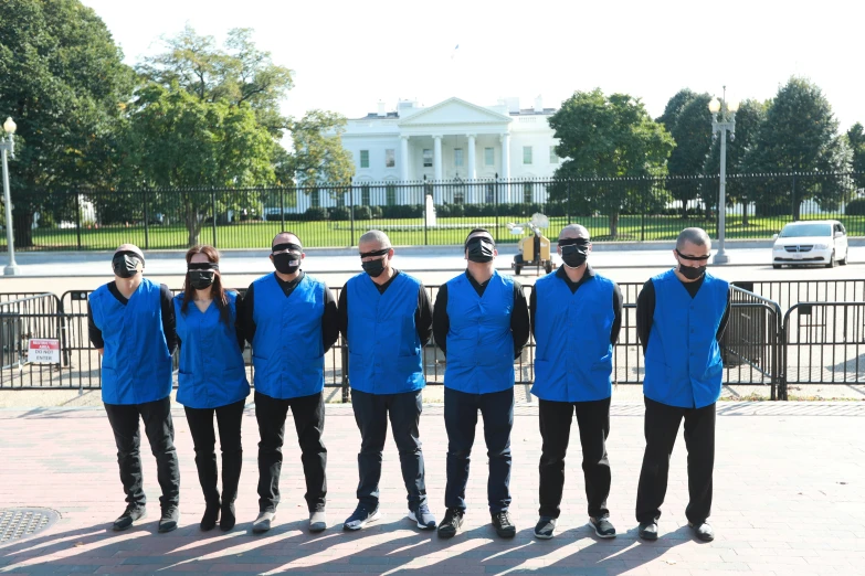 a group of people with eye protections on their faces