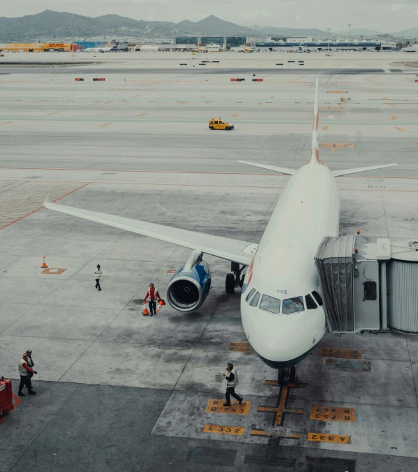 a large airplane on the runway getting ready to take off