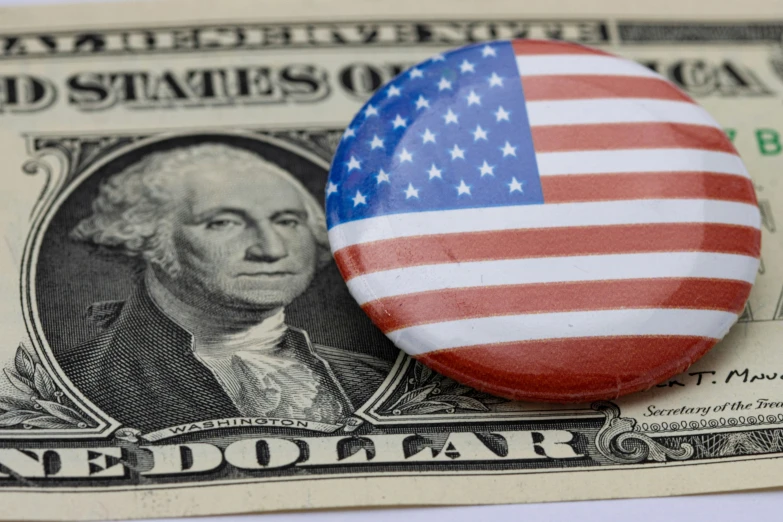a close up of a flag and a us dollar