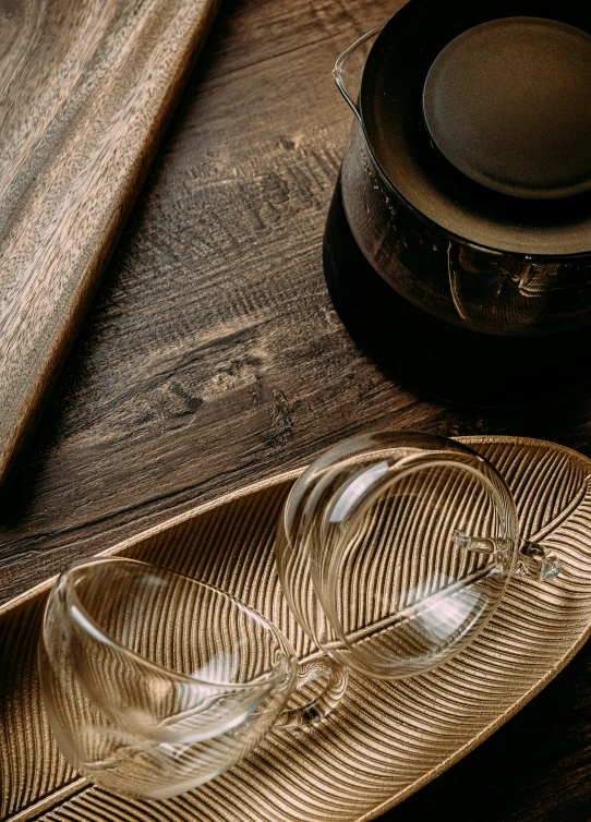 a feather and some other items on a table