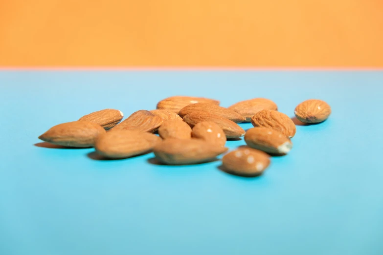 a close up view of some nuts on a blue surface