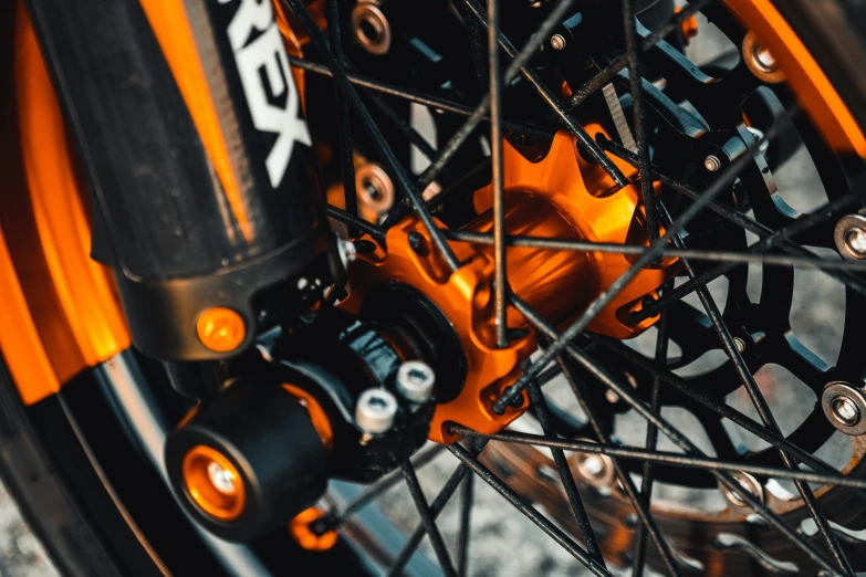 close up view of front wheel and disc on motorcycle