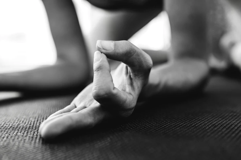 black and white pograph of someone stretching their legs