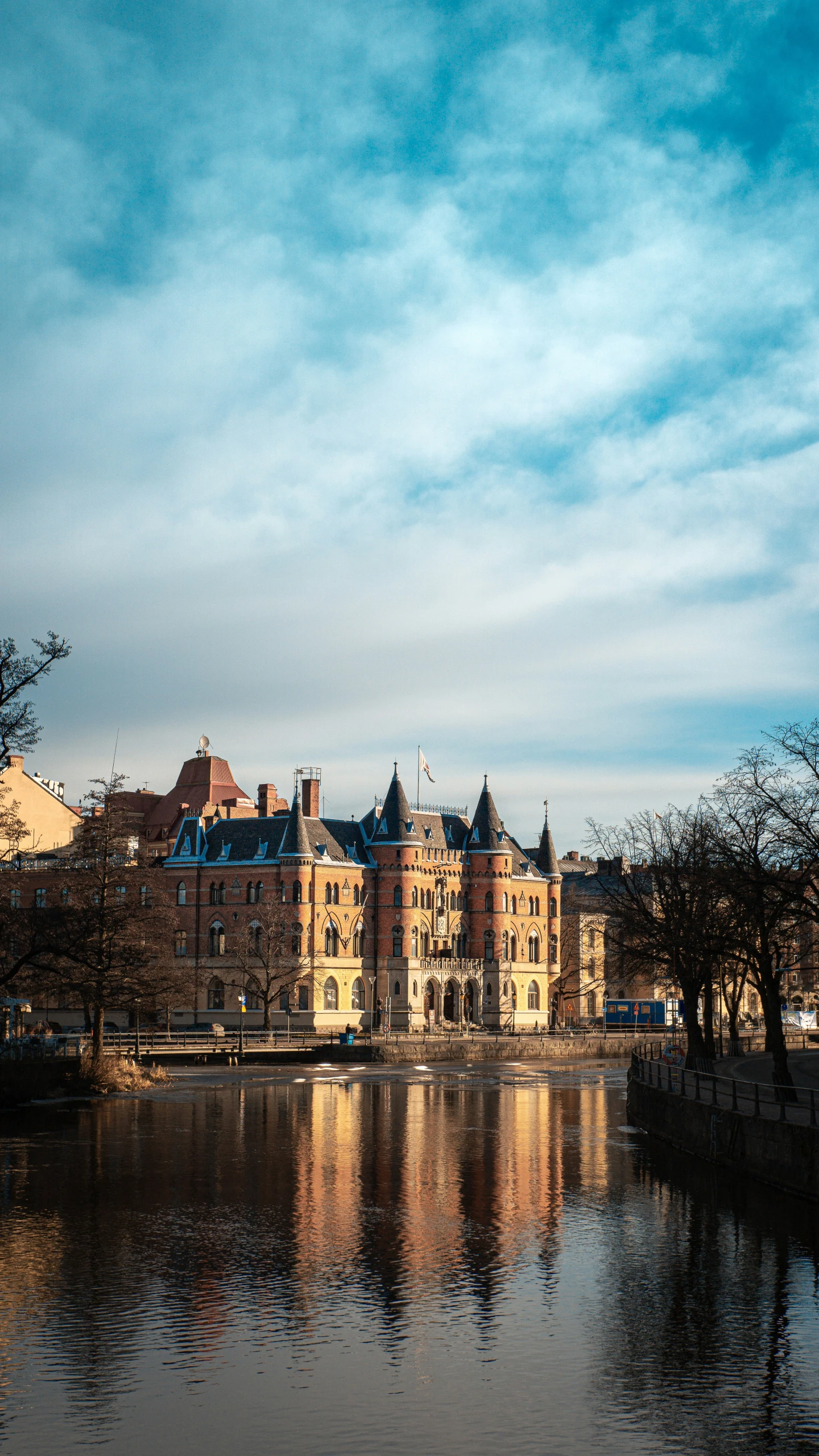 water reflects the building of a city by itself