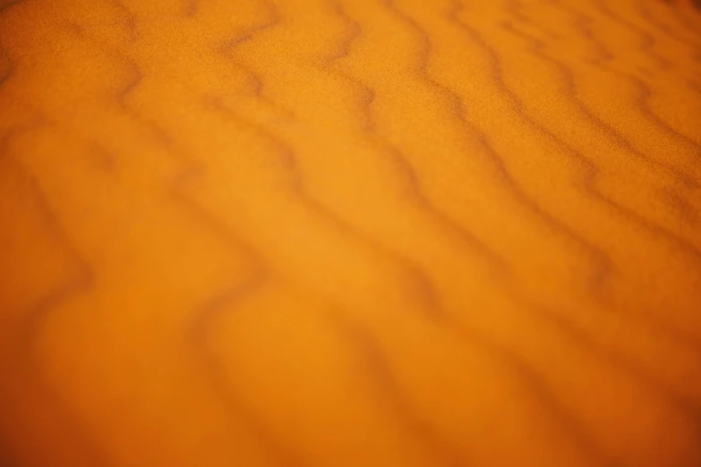 a small brown wood table that is on display