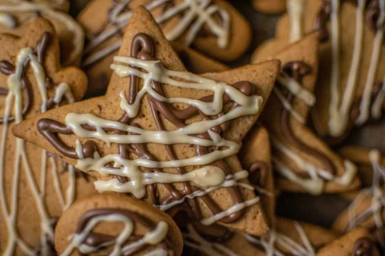 some decorated sugar cookies with white frosting on top