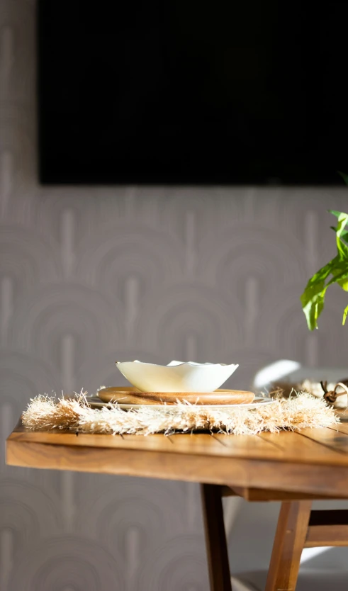 a small white bowl on a table