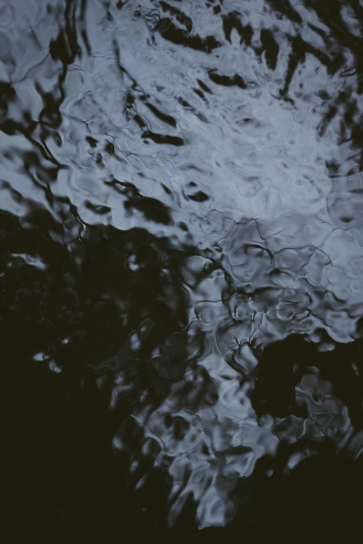 the top view of a large area covered in dark water