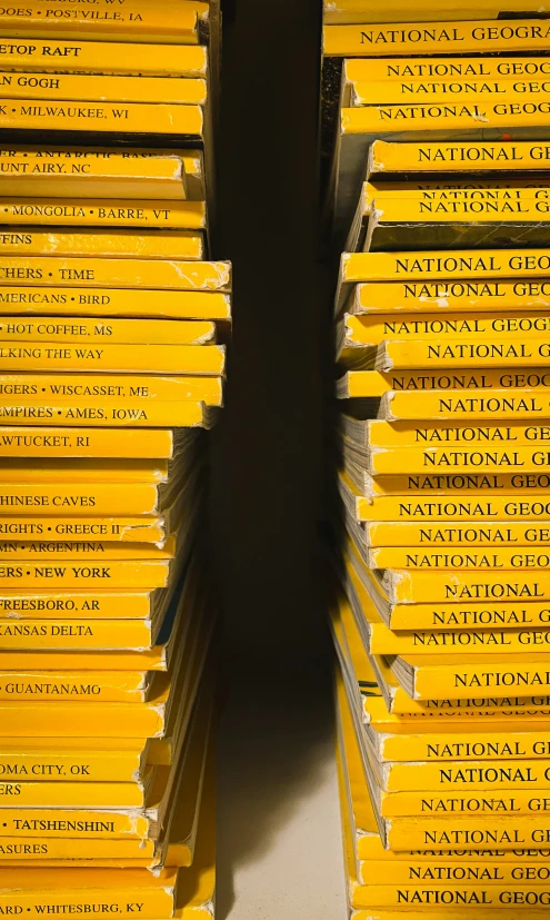 the back half of stacks of books with yellow covers