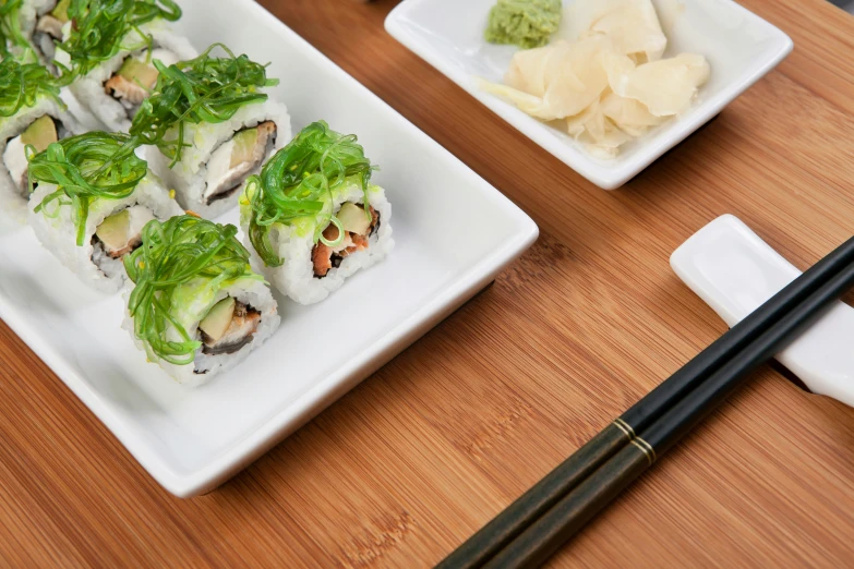 a plate of rice paper filled with different foods