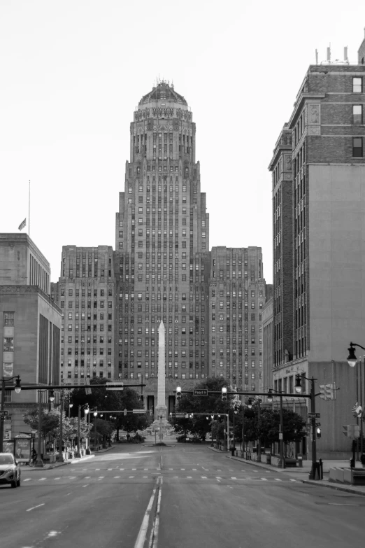 a road with many buildings in the distance