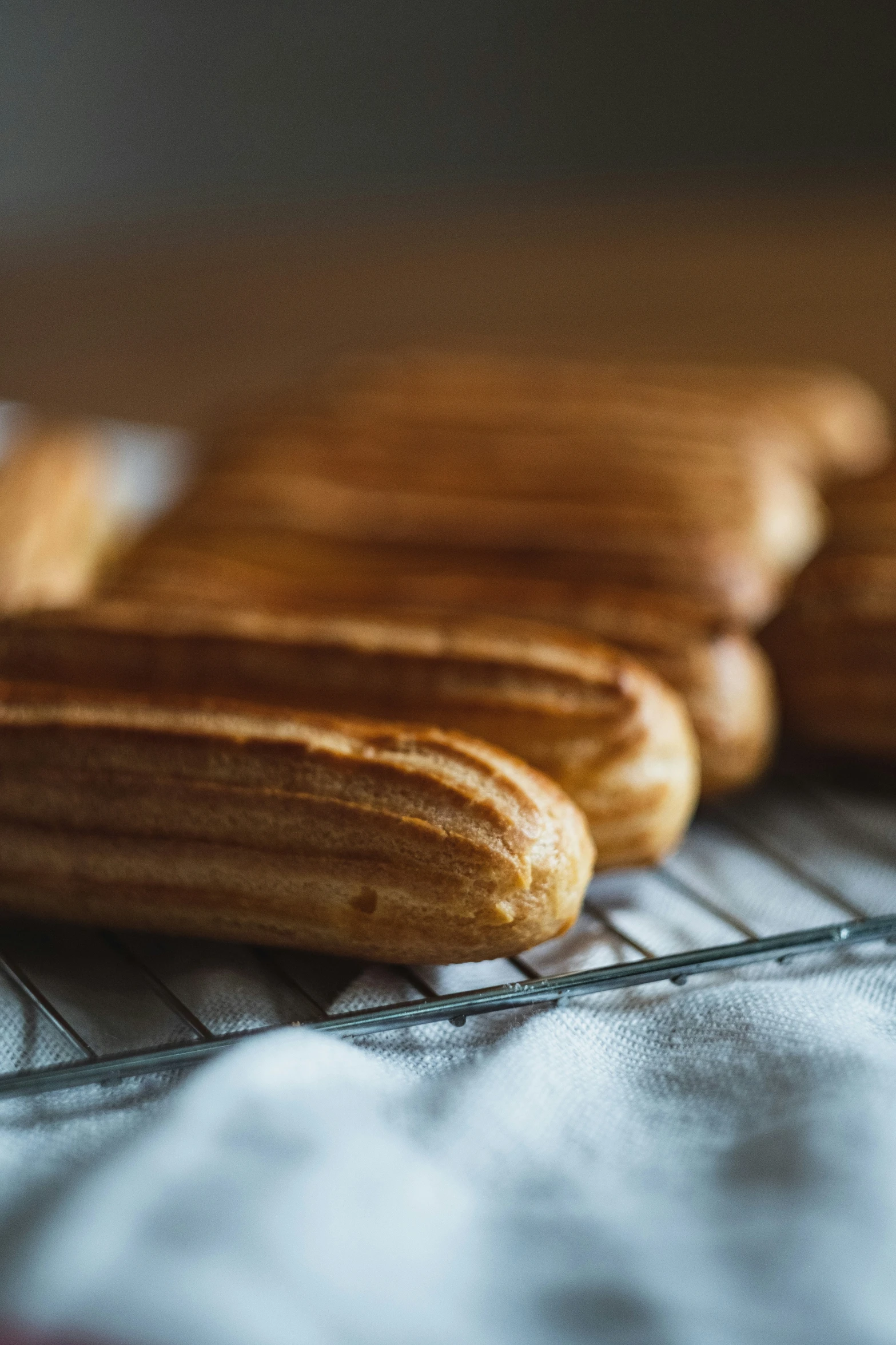 wooden slices are sitting on the cooling rack