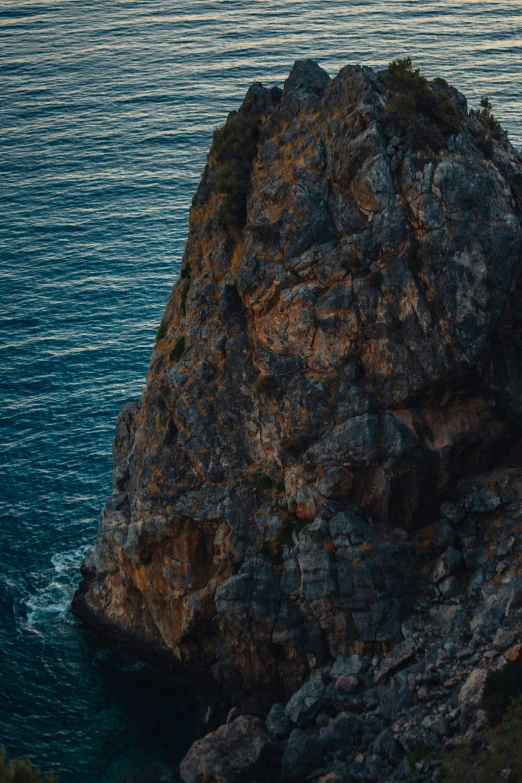 an ocean with lots of small rocks and water