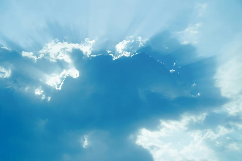 a big blue sky with some white clouds