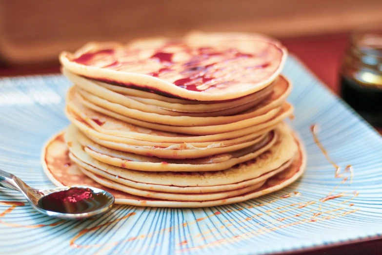 there are lots of pancake sitting on the blue plate