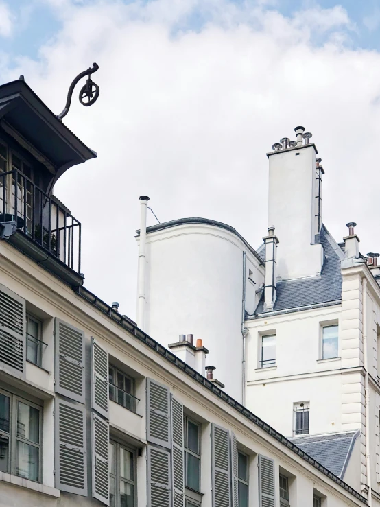 the back of a building with an air plant on top