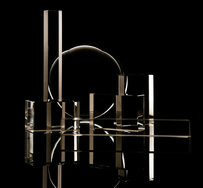 a set of clear objects with a reflective reflection