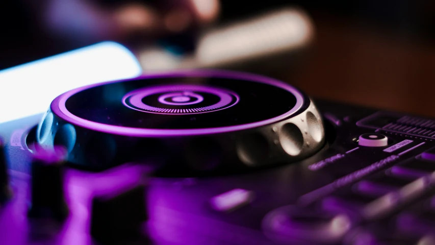 closeup view of purple dj mouse on keyboard