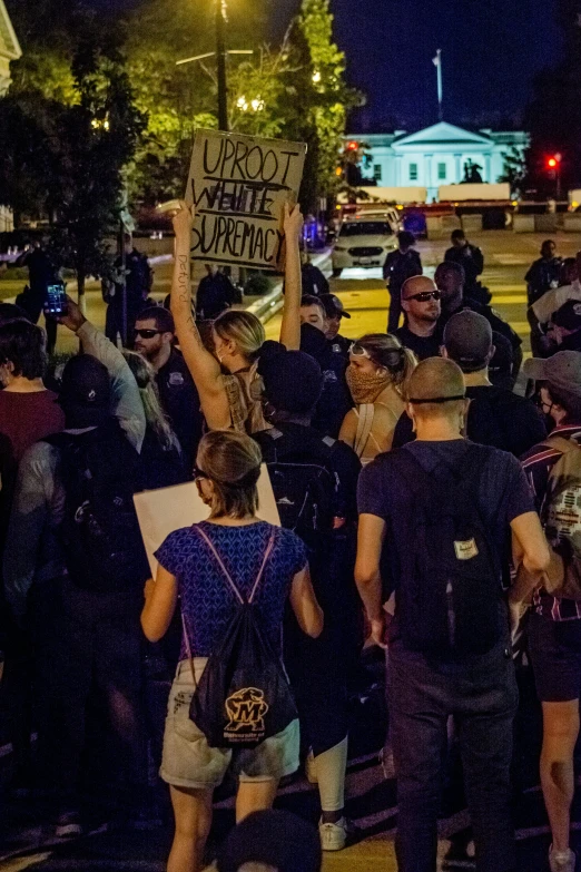 a large group of people are standing together