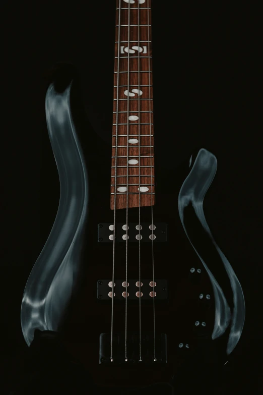 an electric guitar neck and strings that look like an abstract image