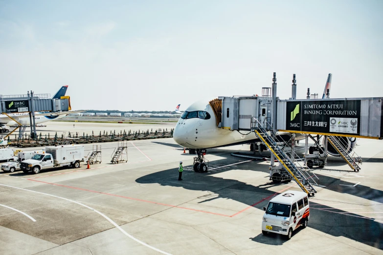 an airport with a plane parked on a runway