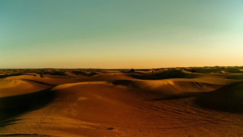 an abstract pograph of sand dunes in the desert