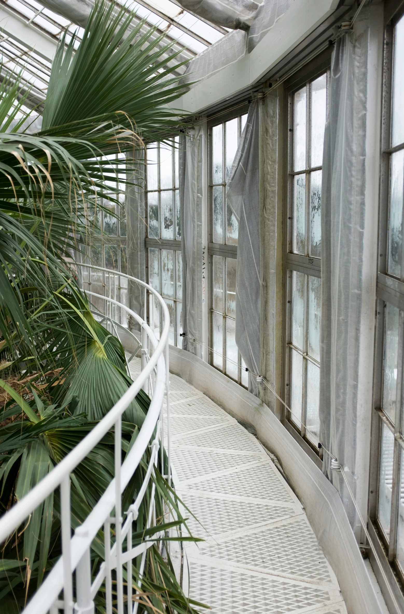 inside of an old building with glass and metal fixtures