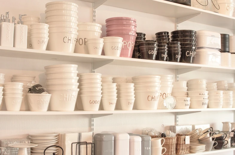 a bunch of shelves filled with lots of dishes