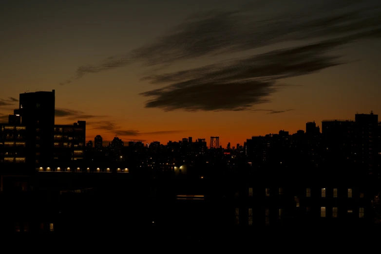 a night sky with city skyline and lights