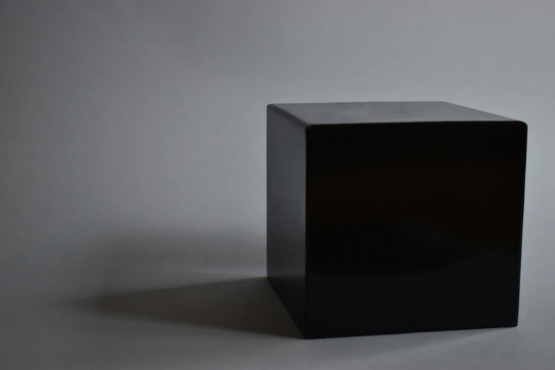 a square object on a table or floor